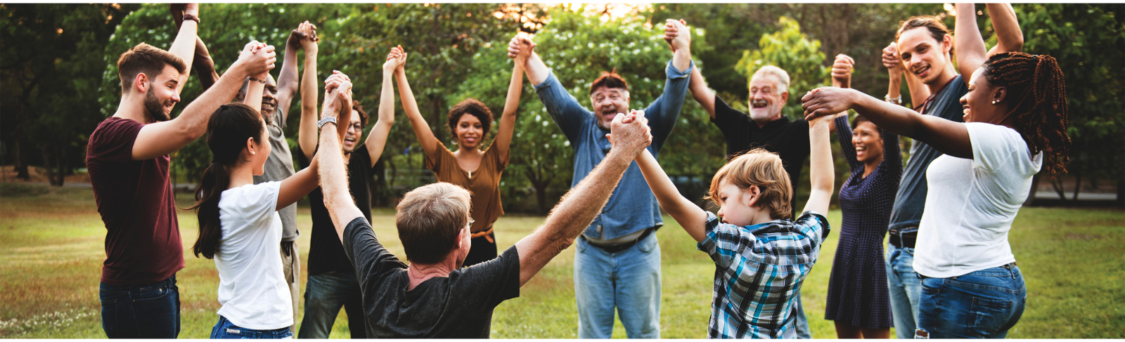 People holding hands in a circle. 