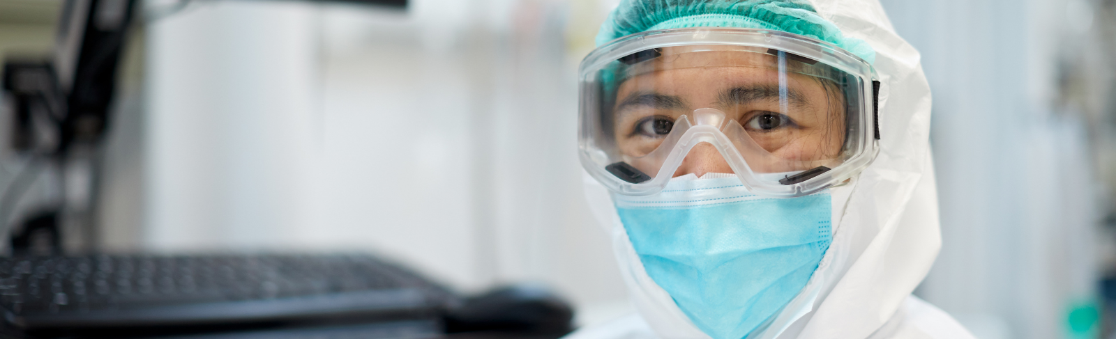 Image of a health care provider outfitted in PPE
