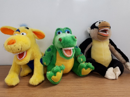 small dinosaur, monkey and dog puppet