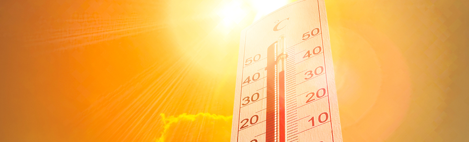 Thermometer in extreme sunlight, indicating high temperature