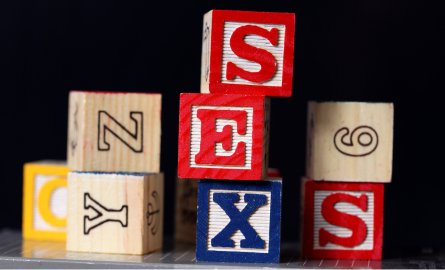 Block letters stacked to spell sex