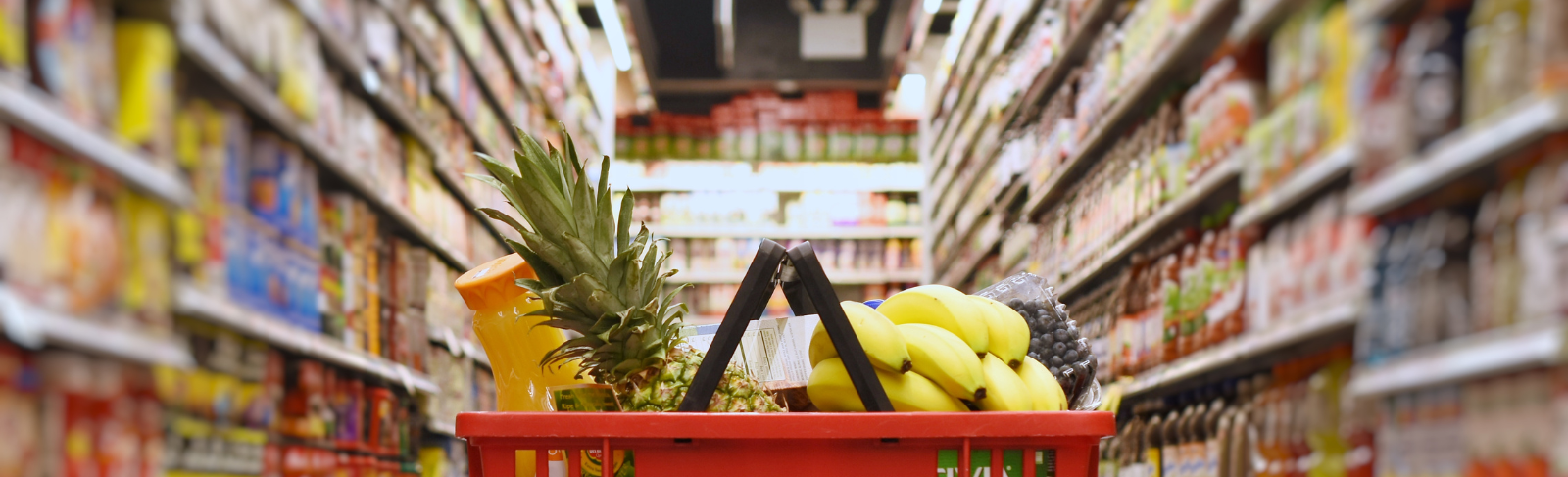 Image of an abandoned shopping basket in a grocery store aisle