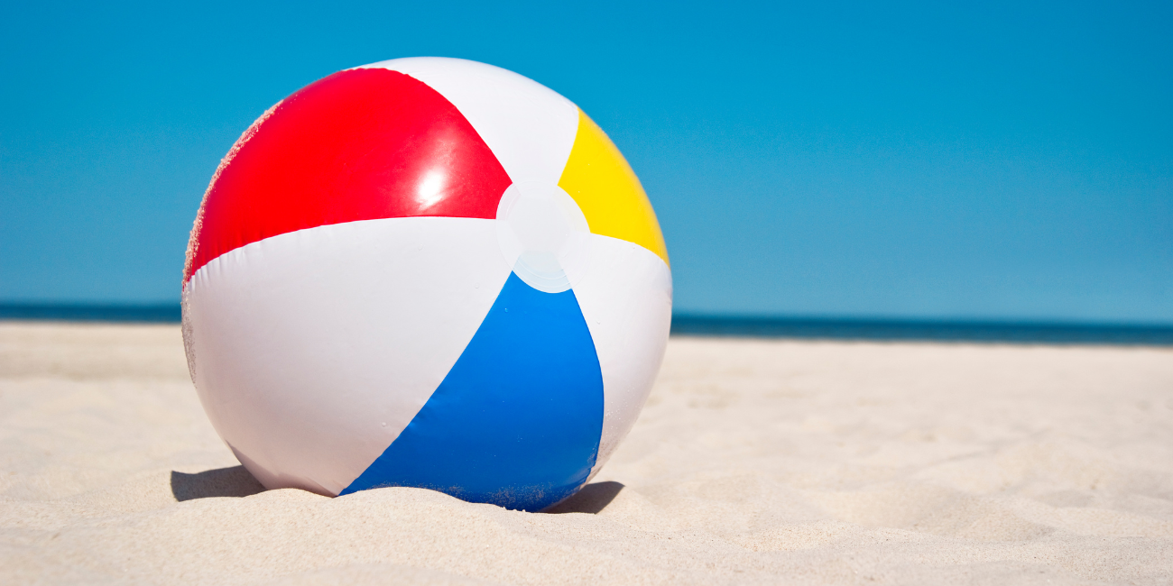 Beach ball on sand
