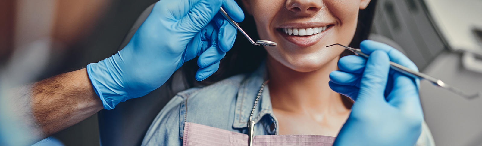 Person having their teeth cleaned.