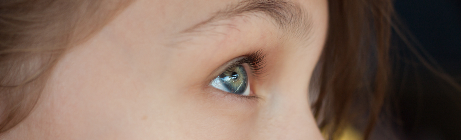 Close-up side profile image of a child's eye