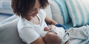 Woman breastfeeding a child. 