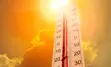 Thermometer in extreme sunlight, indicating high temperature