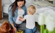 Pregnant woman bonding with toddler